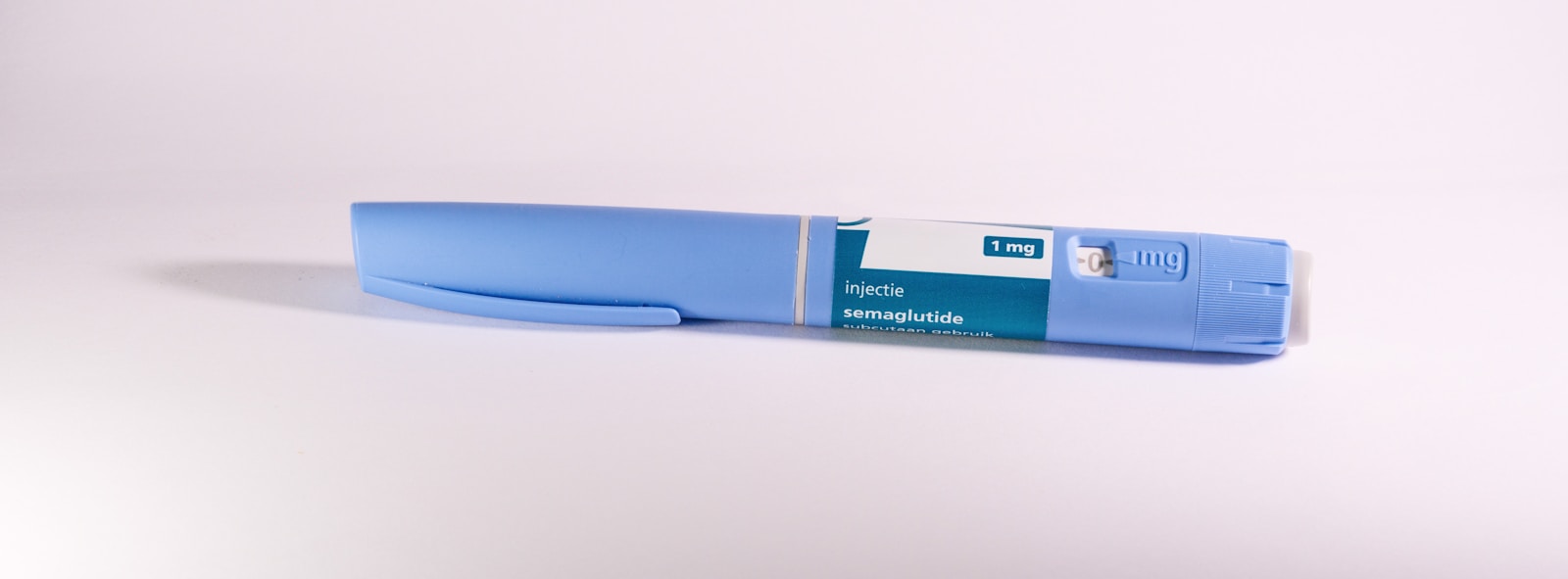 Blue semaglutide injection pen used in medically supervised weight loss treatment